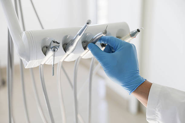 Professional Tooth Extraction technician working in Bland County County, VA